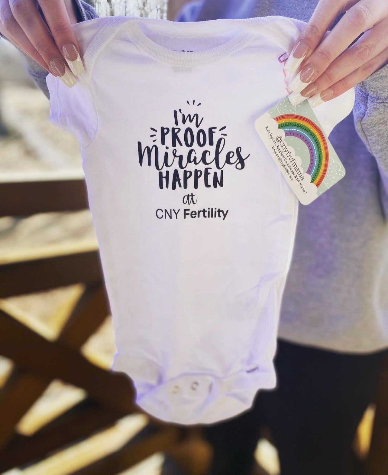Miracles happen at CNY Fertility onesie